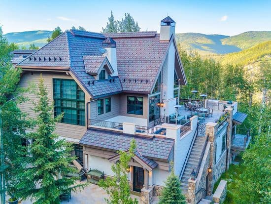 A mountain house among the trees, seen from above